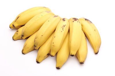 High angle view of bananas on white background