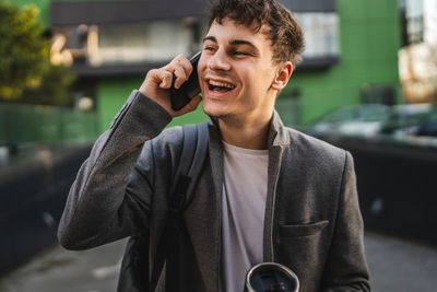Young man using mobile phone