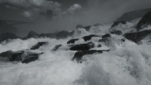Waves splashing on rocks