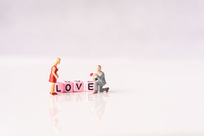 People standing against white background