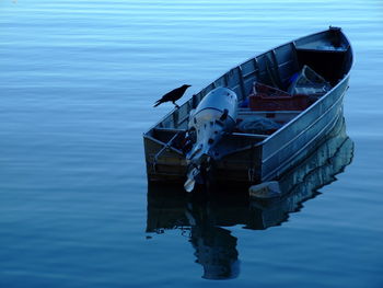 Boat moored in lake