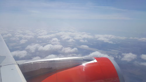 Aerial view of clouds seen from airplane window