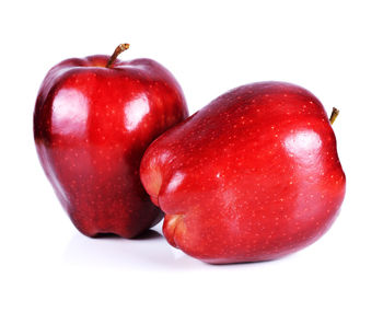 Close-up of apple against white background