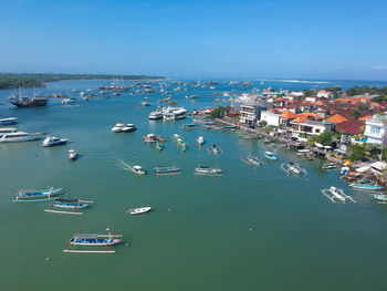 High angle view of boats moored in harbor