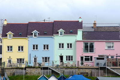 Buildings in city against sky