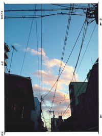 Low angle view of electricity pylon