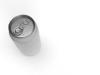 High angle view of beer glass on white background
