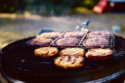 Close-up of meat on barbecue grill