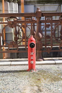 Red fire hydrant on building