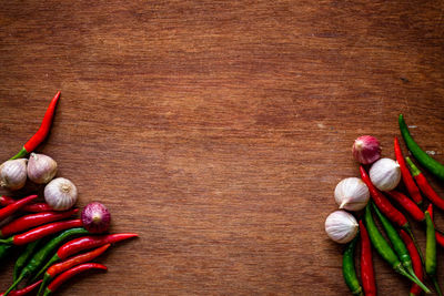 Directly above shot of red chili peppers on table