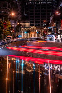 High angle view of illuminated city street at night