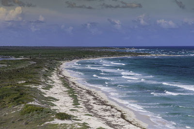 Scenic view of beach against sky