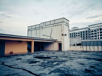 Building against sky during winter