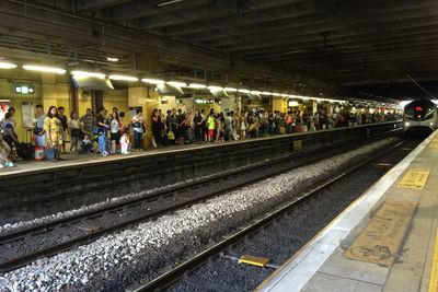 People waiting at subway station