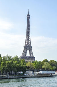 View of tower against cloudy sky