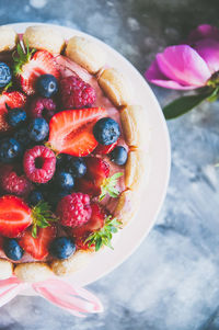 High angle view of strawberries in bowl on table