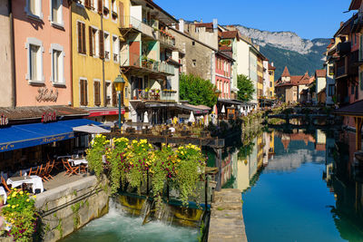 Canal amidst buildings in town