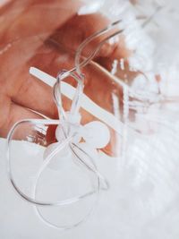 Close-up of hand holding plastic bag