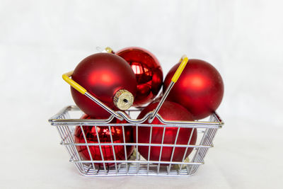 Close-up of fruits in basket on table