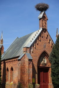 Low angle view of old building against sky