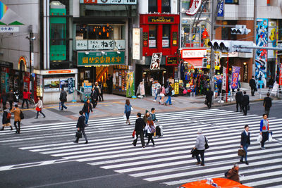 People walking on city street