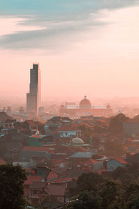 High angle view of townscape against sky at sunset