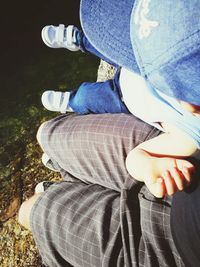 Low section of woman sitting on floor