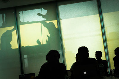 Shadow of people on window