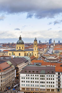 High angle view of buildings in city against sky