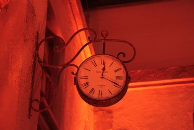 Close-up of clock against wall