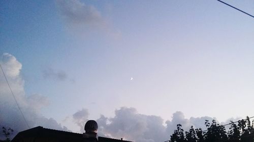 Low angle view of silhouette building against clear sky