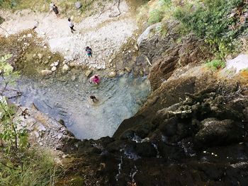 High angle view of river amidst mountains