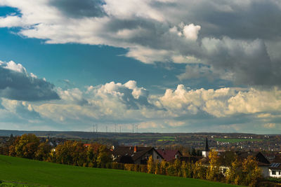 Scenic view of townscape against sky