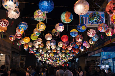 Low angle view of lanterns hanging on ceiling