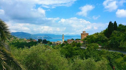 Scenic view of mountains against cloudy sky