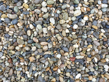 Full frame shot of pebbles on beach