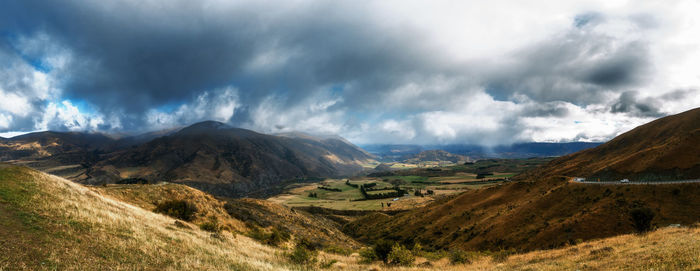 Panoramic view of landscape and mountains against sky