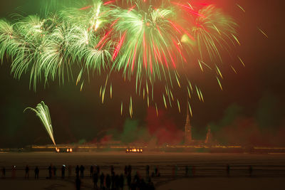 Firework display at night