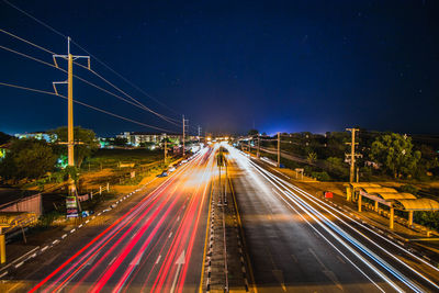 Light trails on road at night