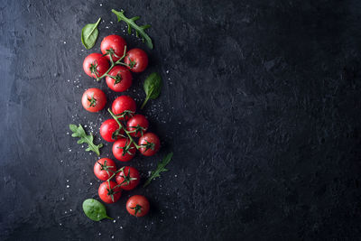 High angle view of cherry tomatoes on table