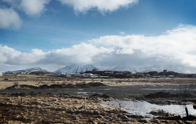 Icelandic village with the enormous mountains in winter, iceland