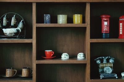 Various containers on shelf at home