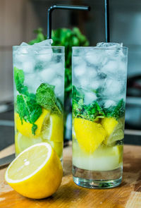 Close-up of mocktails with lemon on table