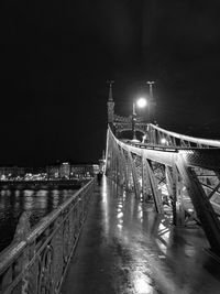 View of bridge in city at night