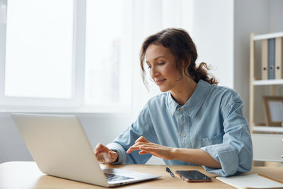 Businesswoman working at office