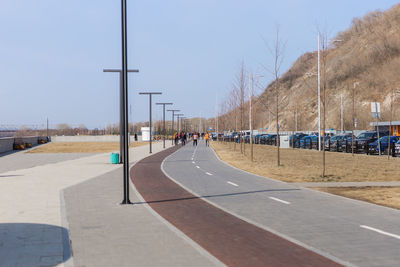 Empty road against clear sky