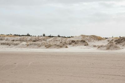 Scenic view of desert against sky