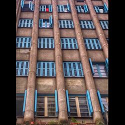 Low angle view of residential building against sky