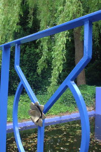 Close-up of playground seen through railing