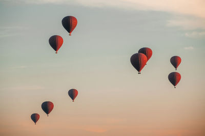 Low angle view of hot air balloons against sky